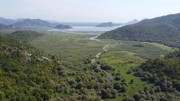 Aerial View of Mountainous Terrain with a Wide Valley