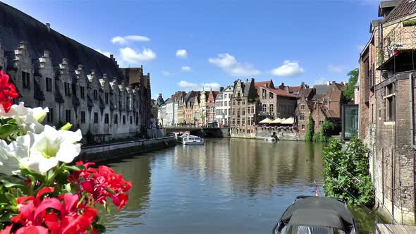 Great Meet House, Grasburg Bridge, and traditional buildings along the Leie River in Ghent, Belgium.