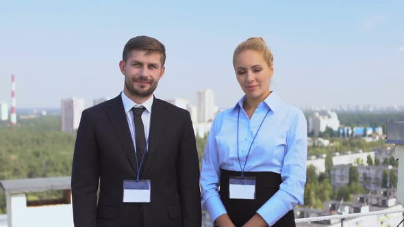 Glad Seminar Participants in Suits Standing Outdoors Looking Camera, Conference