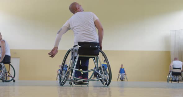 Persons with Disabilities Playing Basketball in the Modern Hall alt