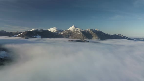 Aerial Foggy Winter Mountains alt
