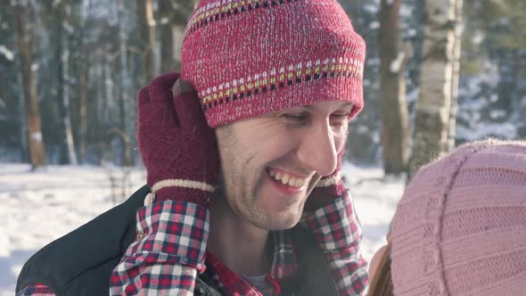 the Face of a Smiling Man in the Winter Park the Sun a Girl Dresses Clothes Cares alt