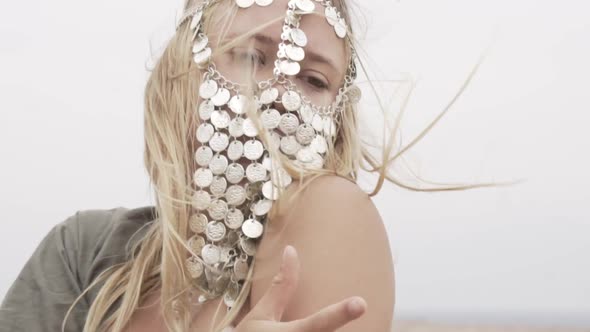 Beautiful Blond Girl Dancing in Oriental Face Mask Closeup Shot