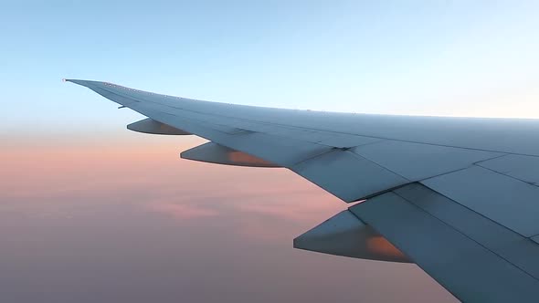 Flying Airplane Wing From Window View. alt