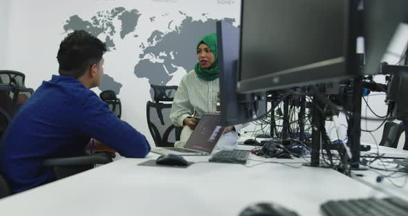 Ethnic People Working Together in Startup Office