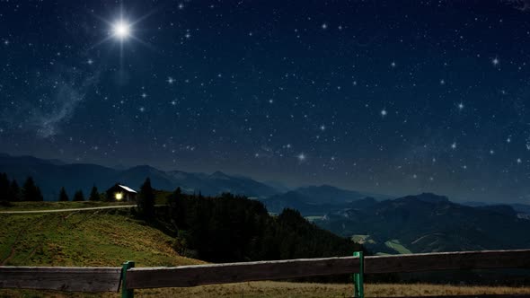The star shines over the manger of christmas of Jesus Christ.