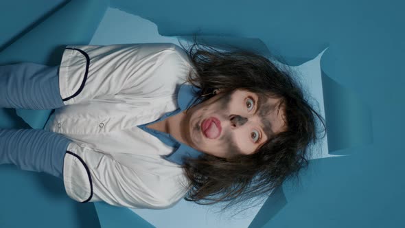 Vertical Video Goofy Mad Woman Chemist Sticking Tongue Out and Acting Crazy alt