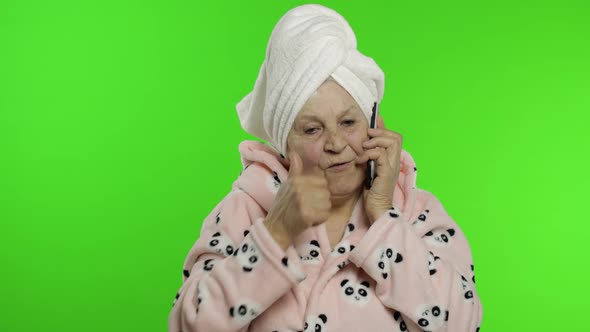Elderly Grandmother After Shower. Old Woman Talking on Mobile Phone. Chroma Key alt