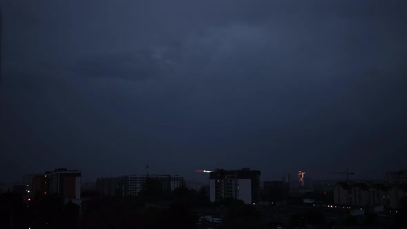 Lightning Bolts Flashes Composition with View of Night City Sky with Clouds alt