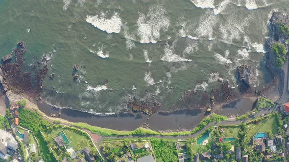 Aerial Footage of Black Volcanic Beach Green Rice Terraces alt