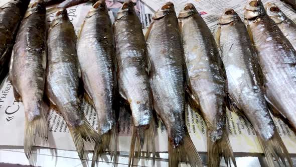 Salted Dried Fish on the Counter in the Rural Market alt