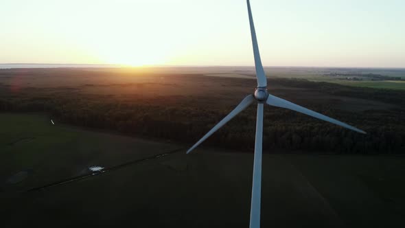 Renewable Wind Power Windmill At Sunset