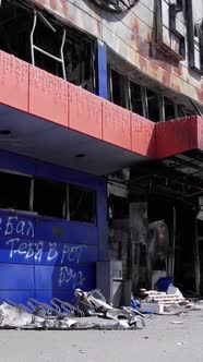 Vertical Video of a Burnt Shopping Center During the War in Bucha Ukraine alt