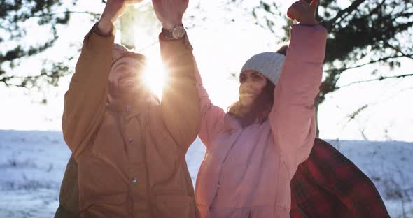 In Amazing Winter Day a Group of Friends Enjoying alt