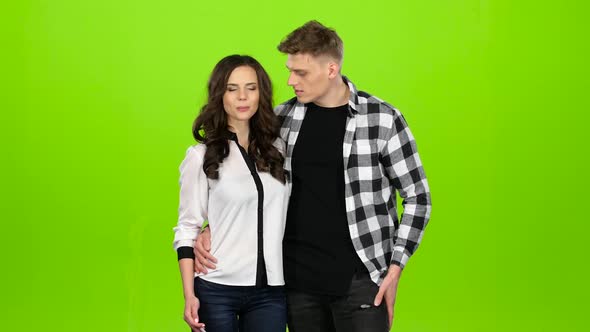 Loving Couple Flirts To Each Other and Makes Selfies. Green Screen alt