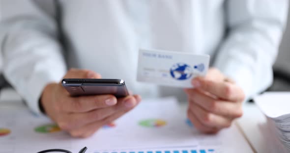 Smartphone and Credit Bank Card in Female Hands