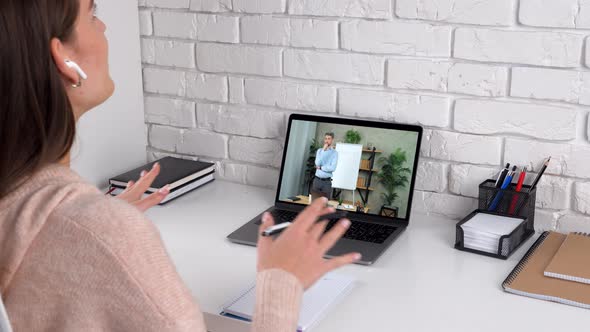 Woman Study at Home Online Video Conference Call Webcam Laptop Tells Teacher alt