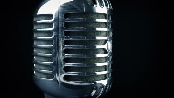 Passing Professional Microphone Closeup Shot alt