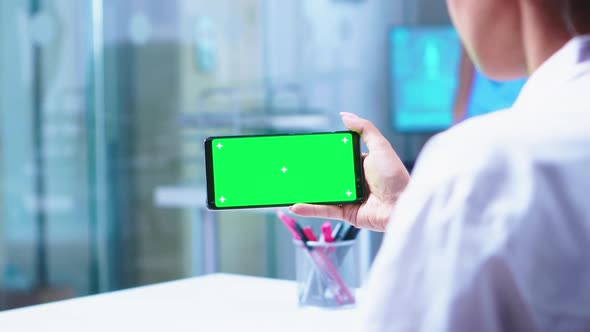 Medical Nurse Opening Glass Door alt