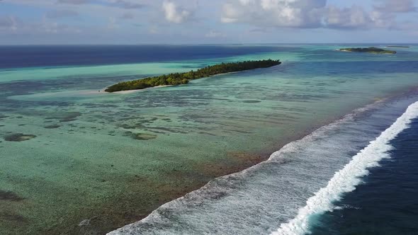 Aerial View of Tropical Island Waves alt