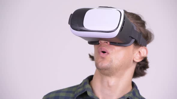 Face of Handsome Hipster Man Using Virtual Reality Headset alt