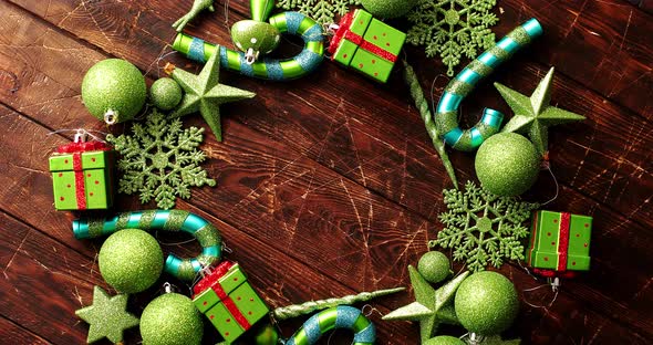 Christmas Ornaments Laid in Circle alt