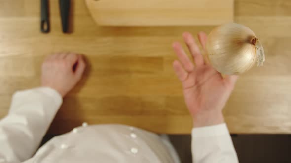 Cook Throws Up Onion Bulb And Catches It