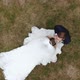 Bride and Groom Embracing Outdoors in Wedding Day - VideoHive Item for Sale