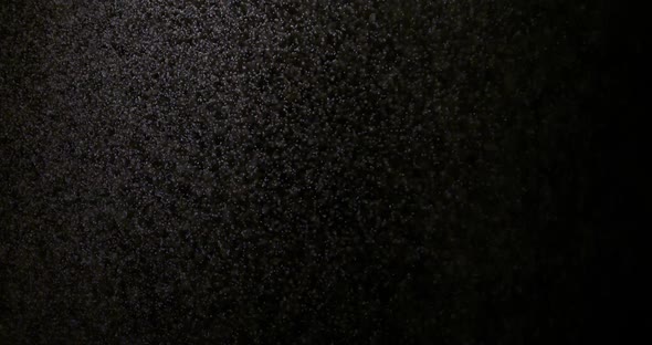 The Effect of Spraying Water on a Black Background Is Suitable To Replace in Your Video alt