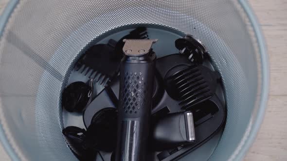 The Trash Can with the Clipper and Its Accessories Rotates Around Its Axis alt