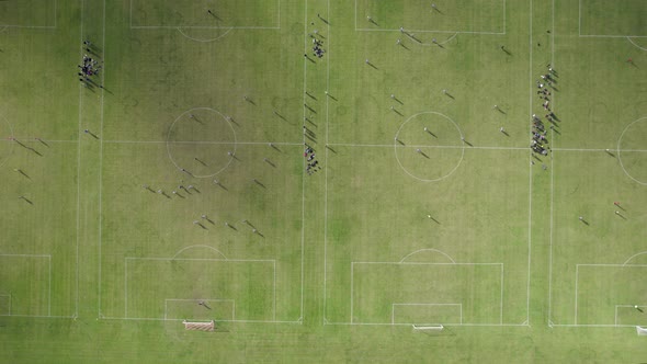 Sunday League Football Matches Taking Place at Hackney Marshes in London alt