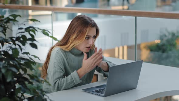 Caucasian Stressful Business Woman with Laptop Frelancer Girl Frustrated Shocked Reading Bad Online alt