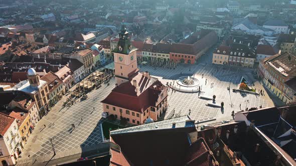 Aerial drone view of The Council Square in Brasov, Romania. Old city centre with County Museum of Hi alt