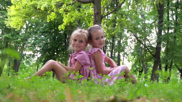 Children playing in the park in summer