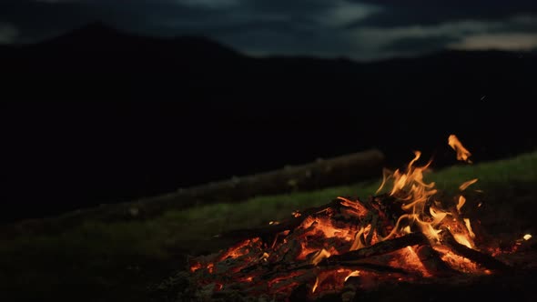 Closeup Camp Fire Burning in Dark Evening Night Mountains Landscape Nature alt