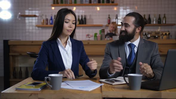 Happy Client Signing Terms of Real Estate Contract alt