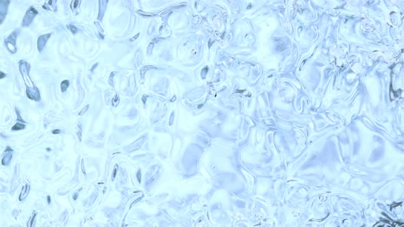 Super Slow Motion Abstract Shot of Waving Blue Clear Water Background at 1000Fps alt