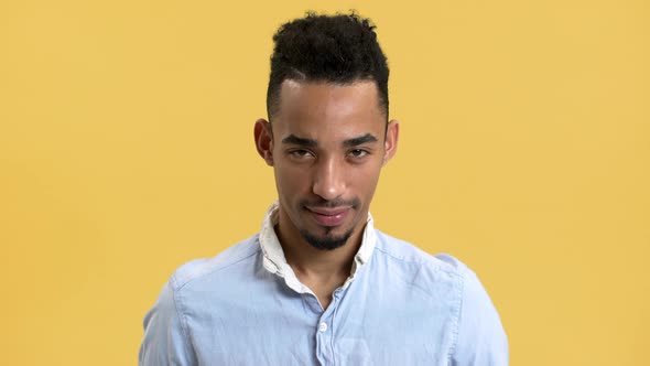 Portrait of Adult Arabic Guy in Formal Wear Looking on Camera and Nodding in Approval Isolated Over alt