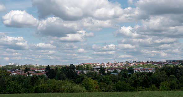 White Clouds in Time Lapse on European Urban Landscape in Southern Germany