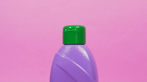 Closeup of a Green Cork on a Purple Bottle of Household Chemicals