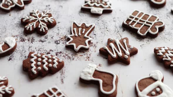 Composition of Delicious Gingerbread Cookies Shaped in Various Christmas Symbols alt