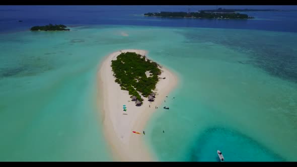 Aerial travel of idyllic lagoon beach wildlife by blue ocean and white sand background of a picnic b alt