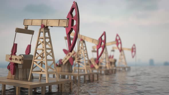 golden oil pump pumps in an ocean of oi