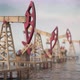 golden oil pump pumps in an ocean of oi - VideoHive Item for Sale