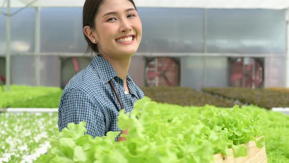 A new generation of asian young woman with organic vegetable business exploring alt