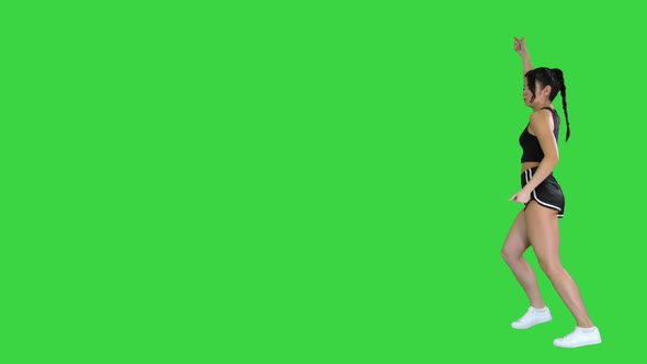 R'n'B Girl in Shorts Walking Dancing on a Green Screen, Chroma Key alt