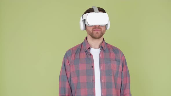 A Young Man Uses Vr Glasses to Work with Innovative Modeling alt