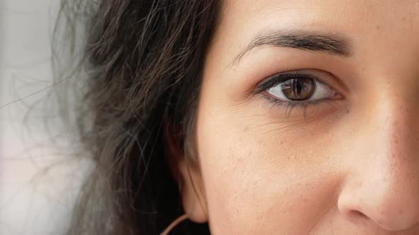 close up portrait of hindu ethnicity american woman looking to camera. mixed race woman