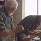 Young Woman Learning Pottery with Senior Teacher - VideoHive Item for Sale