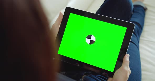 Woman Holding Tablet Chromakey Indoors